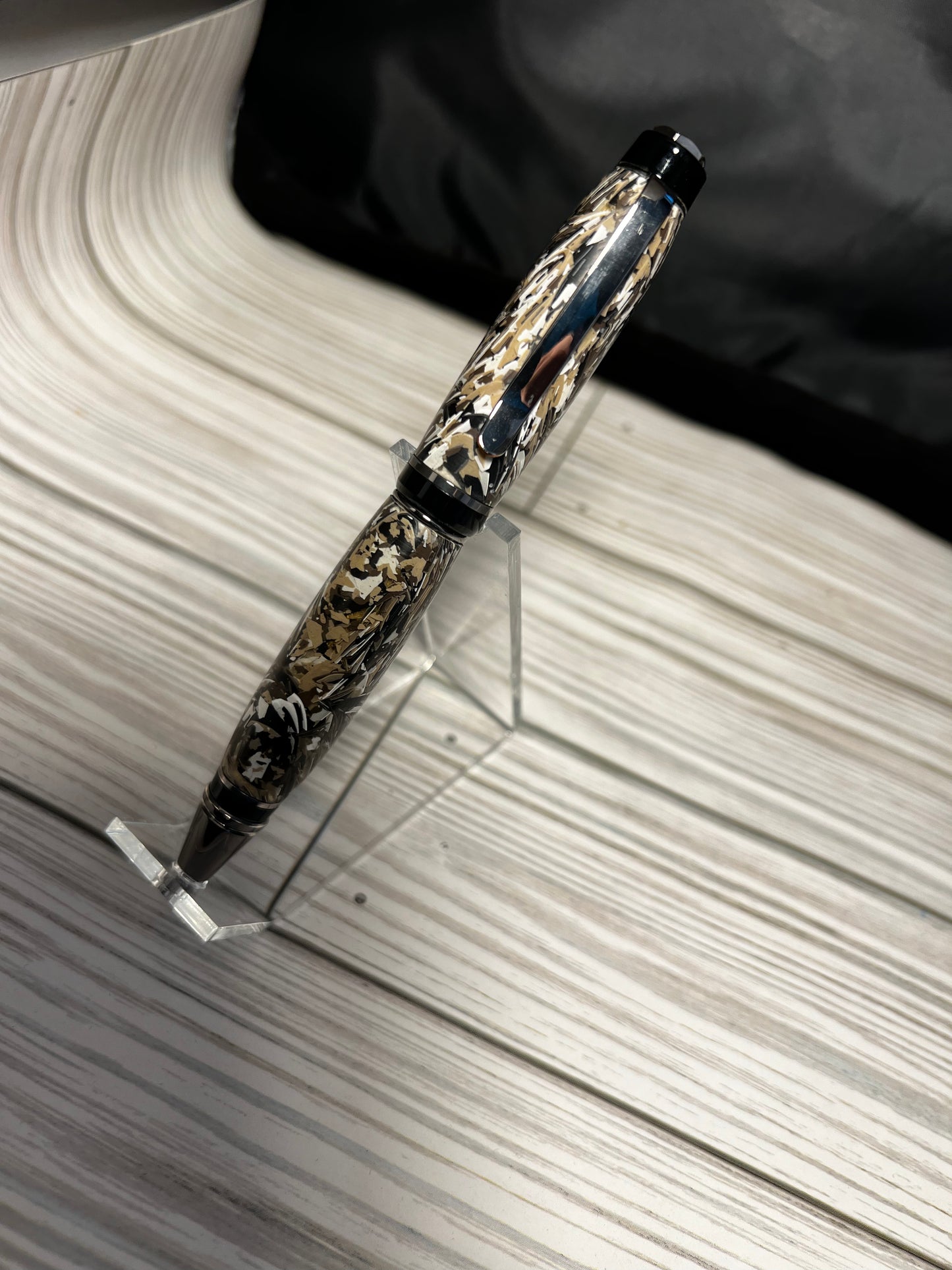 Cigar pen from paint chips.
